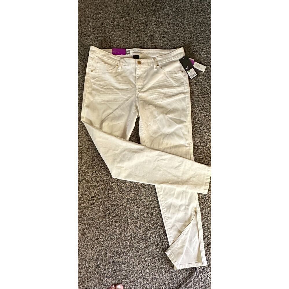 Size 12 new with tag denim legging super stretchy, mid rise, fitted hip and thig